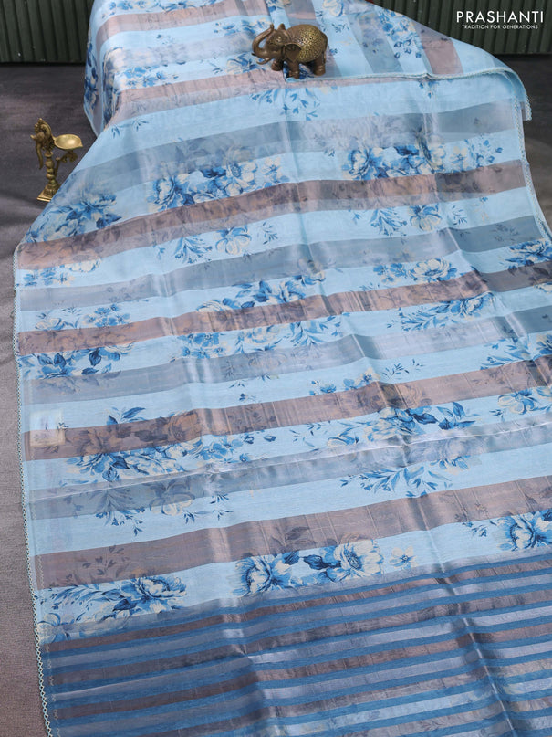 Organza tissue tussar saree light blue with floral prints and lace work border