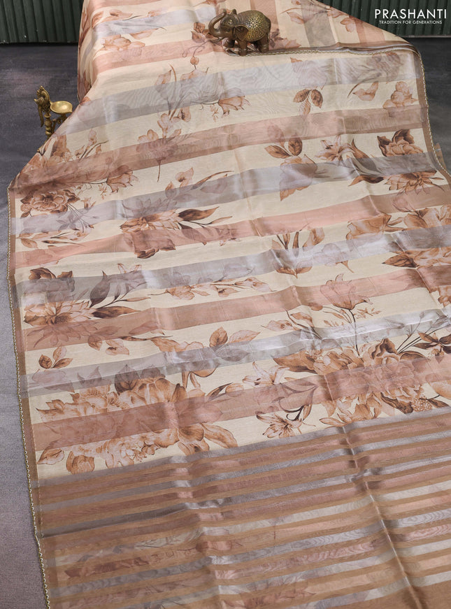 Organza tissue tussar saree sandal with floral prints and lace work border