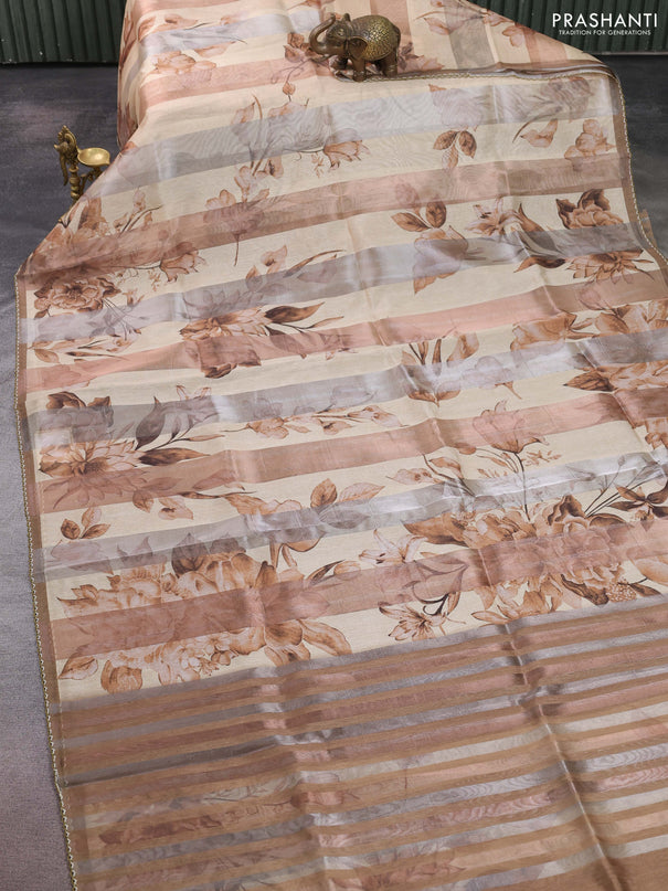 Organza tissue tussar saree sandal with floral prints and lace work border
