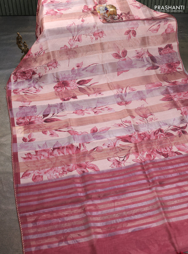 Organza tissue tussar saree peach shade with floral prints and lace work border