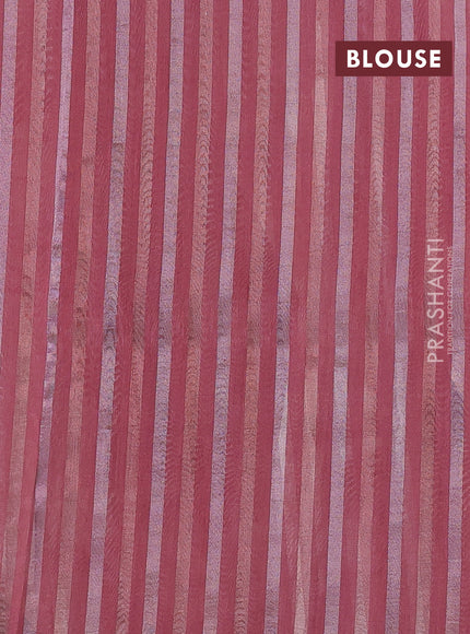 Organza tissue tussar saree peach shade with floral prints and lace work border