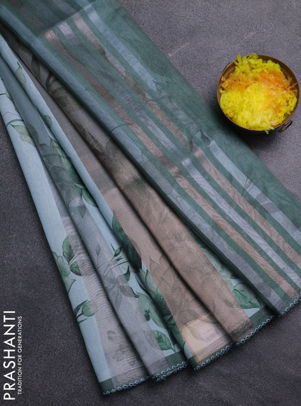 Organza tissue tussar saree teal shade with floral prints and lace work border