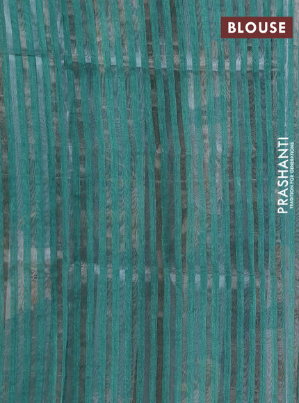 Organza tissue tussar saree green with floral prints and lace work border