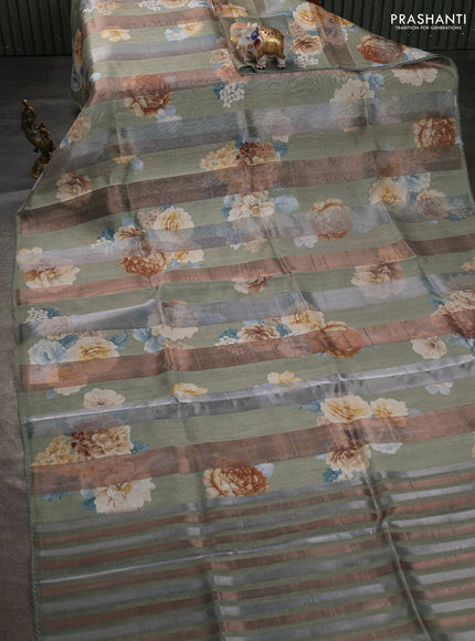 Organza tissue tussar saree pista green with floral prints and lace work border