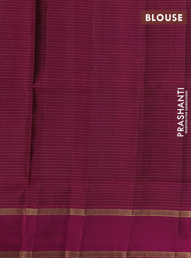 Pure soft silk saree blue and magenta pink with allover zari checks & buttas and rettapet zari woven border