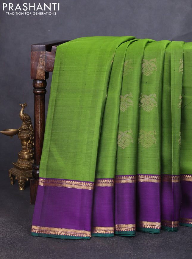 Pure soft silk saree green and violet with zari woven buttas and rettapet zari woven border