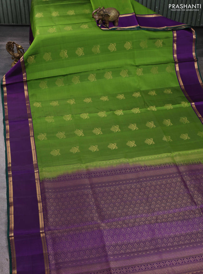 Pure soft silk saree green and violet with zari woven buttas and rettapet zari woven border