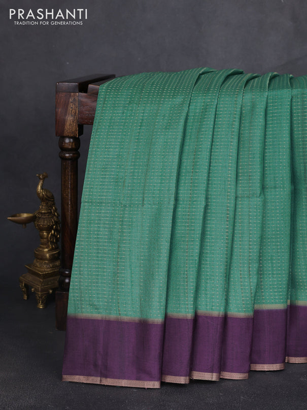 Semi tussar saree teal green and deep purple with allover zari weaves and rettapet zari woven border