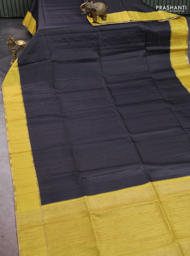 Semi tussar saree black and lime yellow with allover zari weaves and rettapet zari woven border