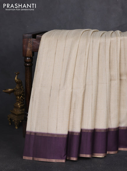 Semi tussar saree off white and deep purple with allover zari weaves and rettapet zari woven border