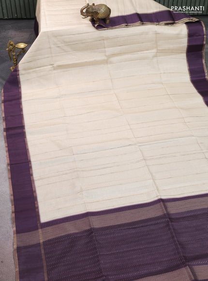 Semi tussar saree off white and deep purple with allover zari weaves and rettapet zari woven border
