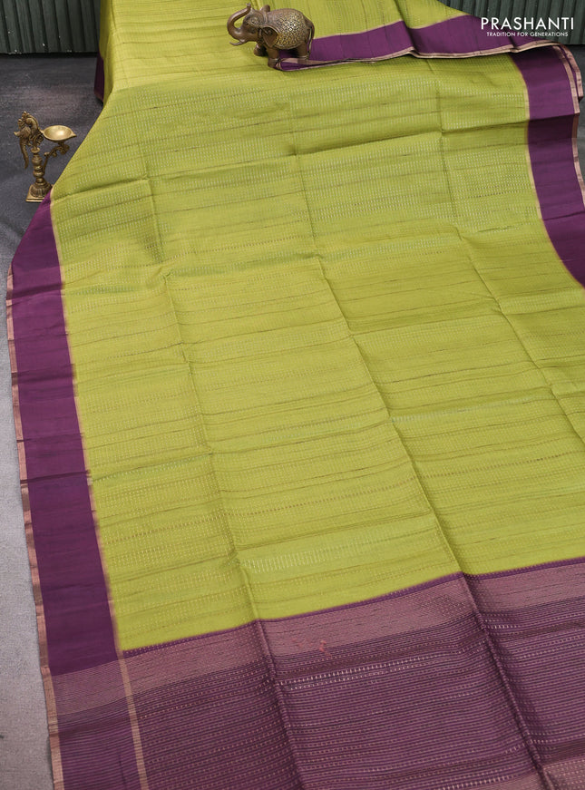Semi tussar saree light green and purple with allover zari weaves and rettapet zari woven border