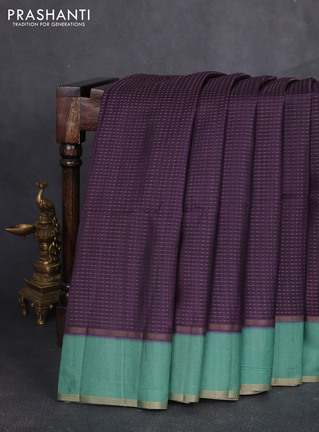 Semi tussar saree deep purple and teal green with allover zari weaves and rettapet zari woven border