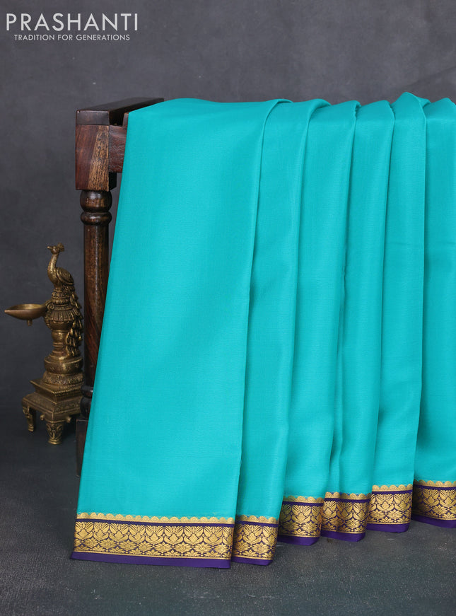 Pure mysore silk saree teal blue and violet shade with plain body and zari woven border