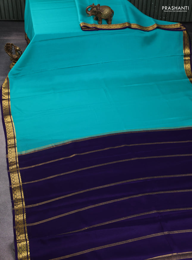 Pure mysore silk saree teal blue and violet shade with plain body and zari woven border