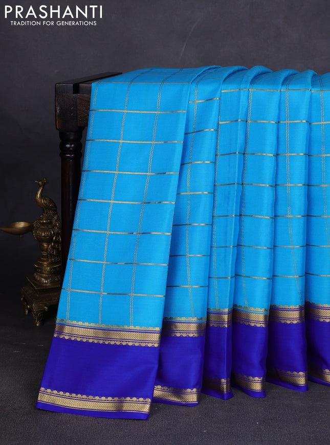 Pure mysore silk saree light blue and royal blue with allover zari checked pattern and rettapet zari woven border