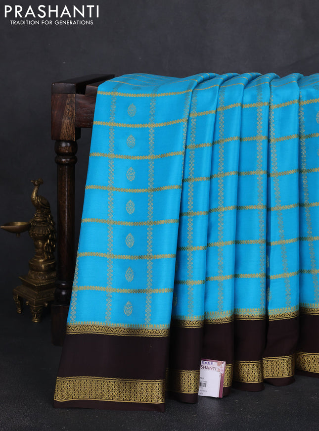 Pure mysore silk saree light blue and coffee brown with allover zari checks & buttas and rettapet zari woven border