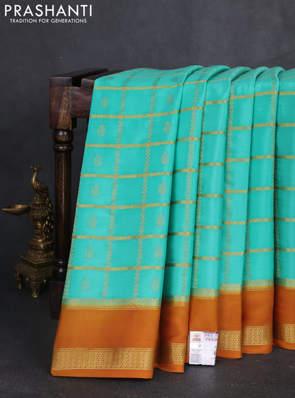 Pure mysore silk saree teal green shade and dark mustard with allover zari checks & buttas and rettapet zari woven border