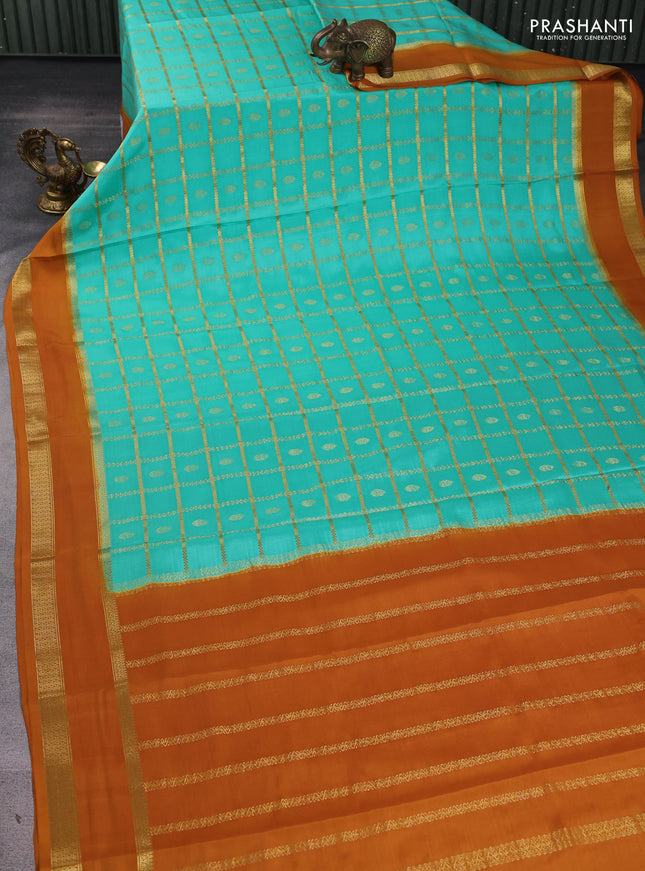 Pure mysore silk saree teal green shade and dark mustard with allover zari checks & buttas and rettapet zari woven border
