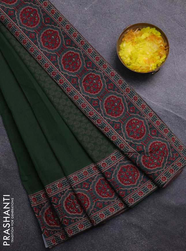 Chirala cotton saree bottle green with plain body and printed border