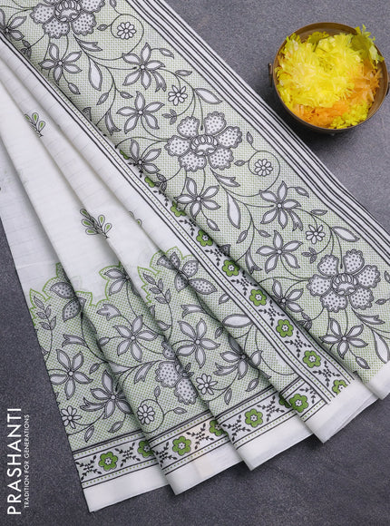 Chirala cotton saree off white and green with allover silver zari stripe & butta prints and long printed border