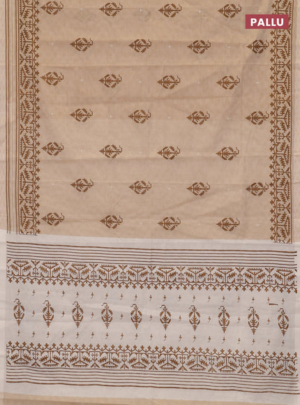 Chirala cotton saree sandal and cream with allover self emboss & butta prints and printed zari border
