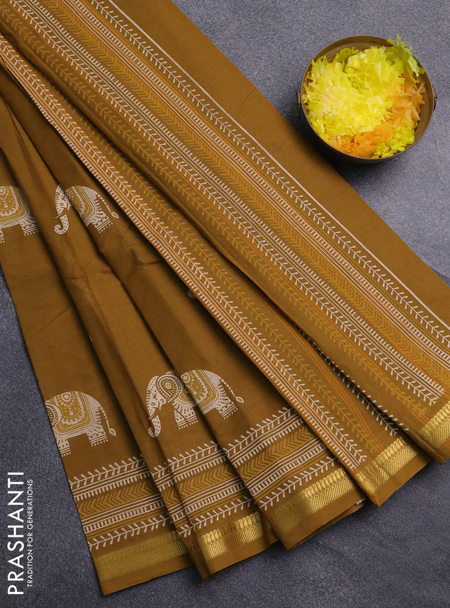 Chirala cotton saree dark mustard with elephant butta prints and printed zari border