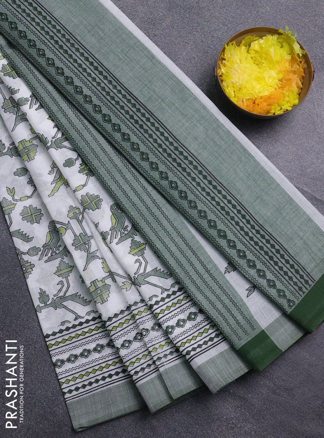 Chirala cotton saree off white and green with allover patola prints and printed border