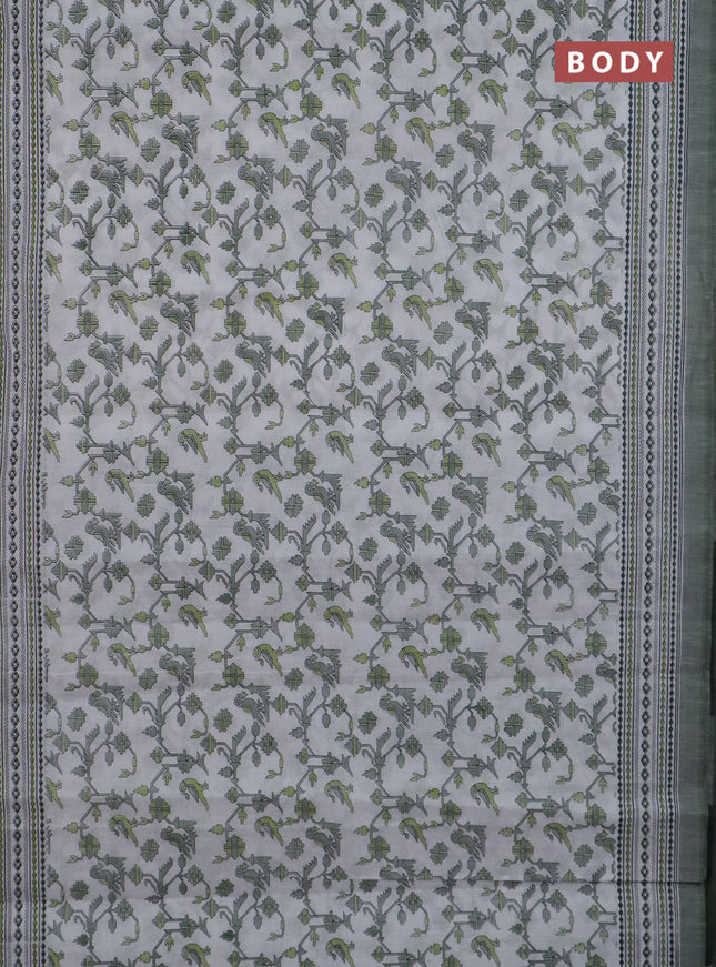 Chirala cotton saree off white and green with allover patola prints and printed border