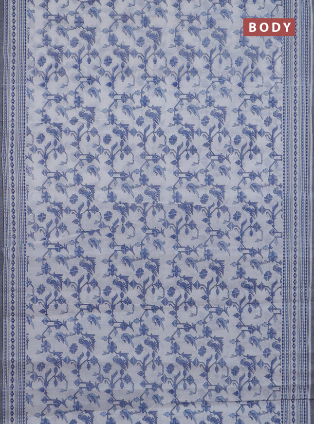 Chirala cotton saree off white and blue with allover patola prints and printed border
