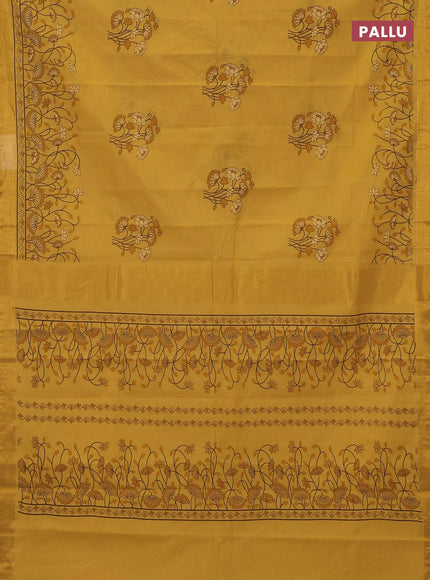 Chirala cotton saree yellow shade with floral butta prints and printed zari border