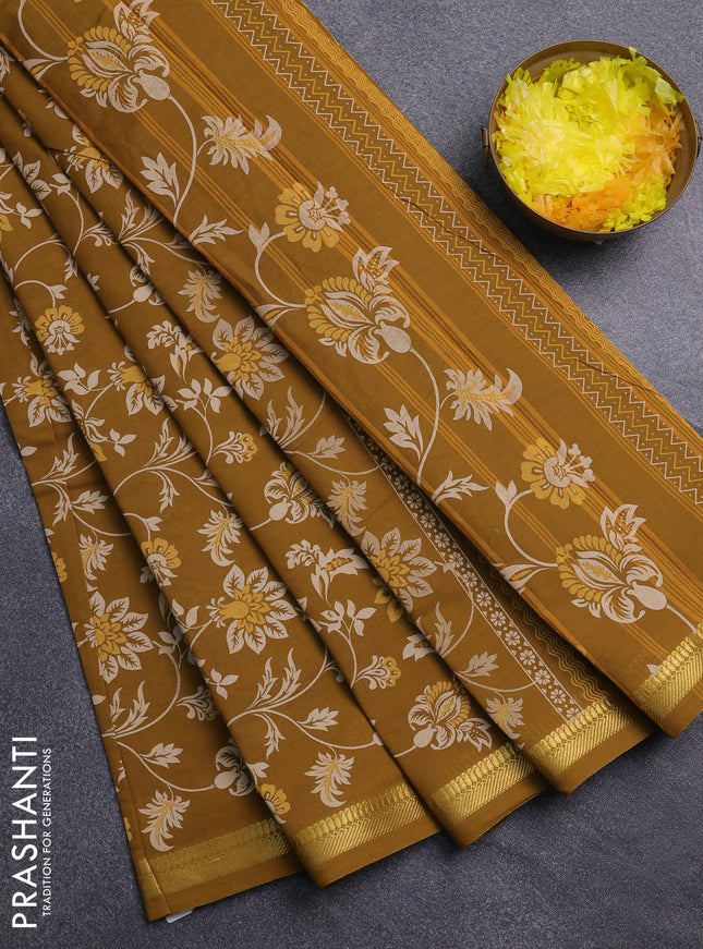 Chirala cotton saree dark mustard with allover prints and zari woven border