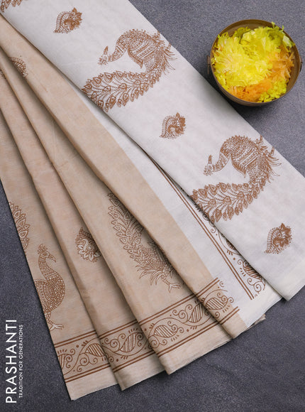 Chirala cotton saree sandal with allover self emboss & butta prints and printed zari border