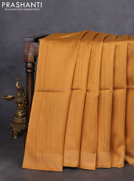 Pure dupion silk saree mustard yellow and beige with plain body and patola printed pallu