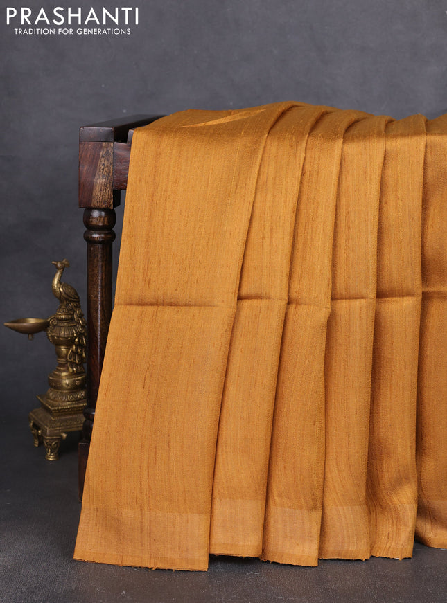 Pure dupion silk saree mustard yellow and beige with plain body and patola printed pallu