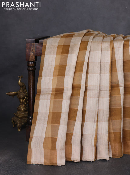 Pure dupion silk saree beige mustard yellow and dark sandal with allover zari woven checked pattern and concept printed pallu