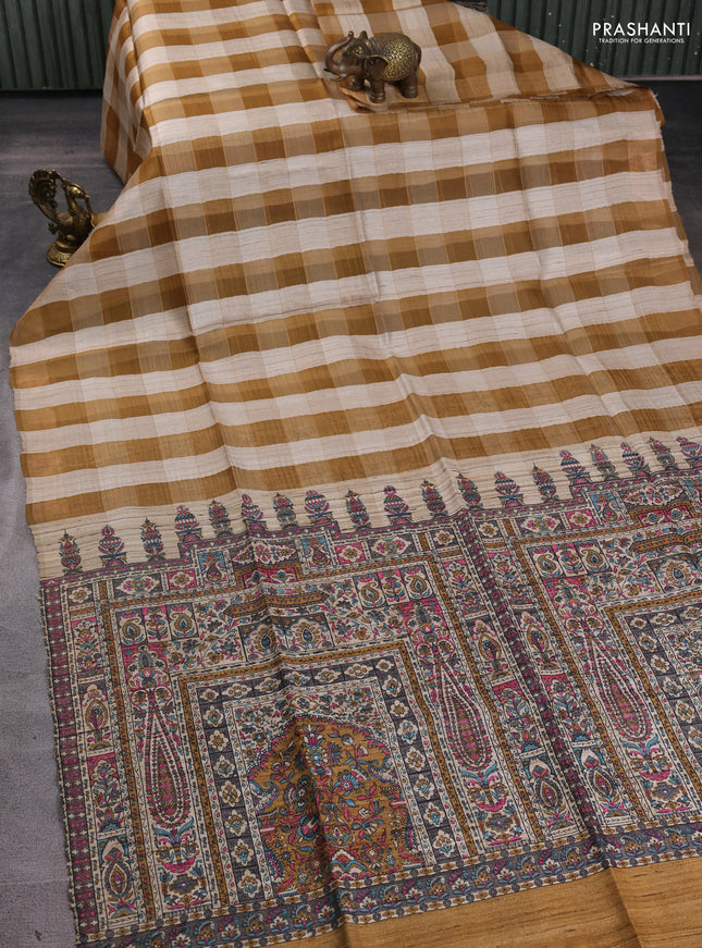 Pure dupion silk saree beige mustard yellow and dark sandal with allover zari woven checked pattern and concept printed pallu