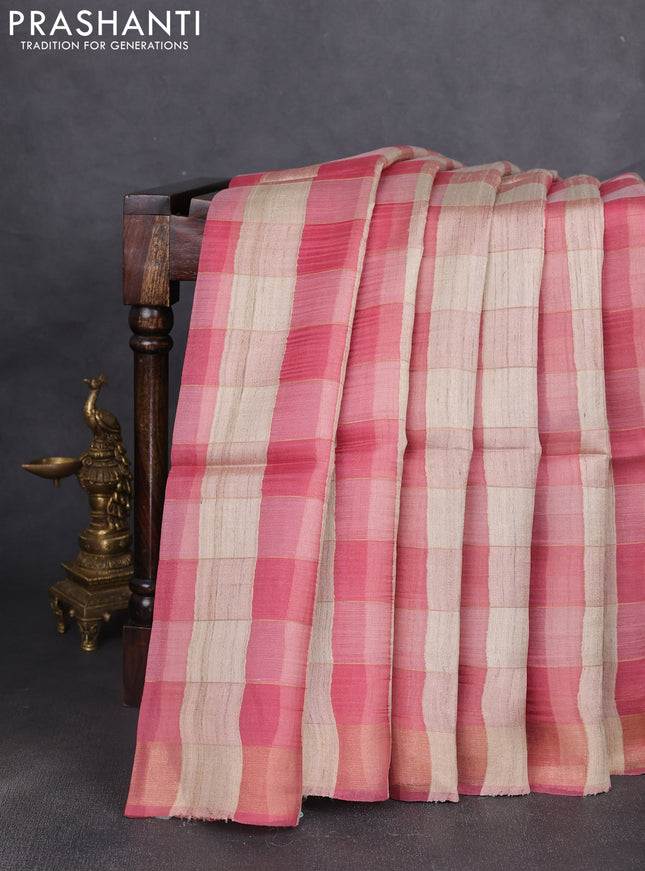 Pure dupion silk saree beige pink and pink with allover zari woven checked pattern and concept printed pallu