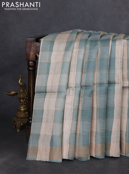 Pure dupion silk saree beige pastel blue and teal blue with allover zari woven checked pattern and concept printed pallu
