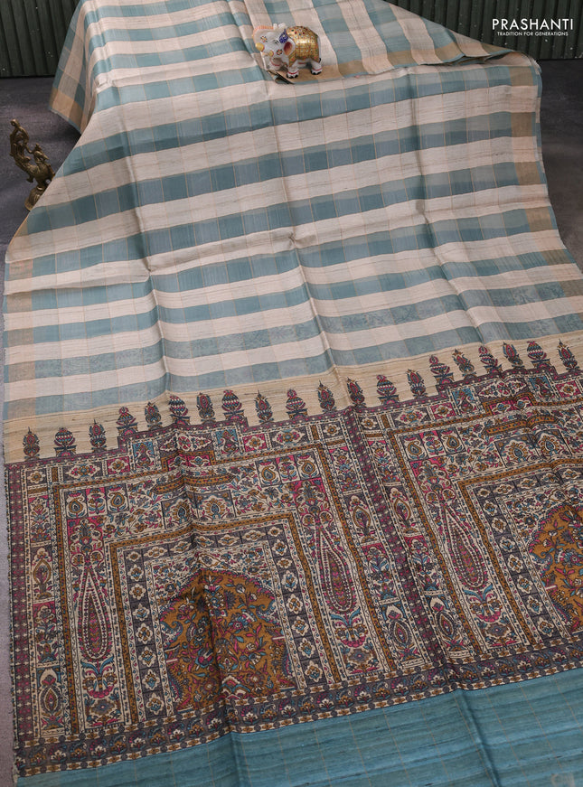 Pure dupion silk saree beige pastel blue and teal blue with allover zari woven checked pattern and concept printed pallu
