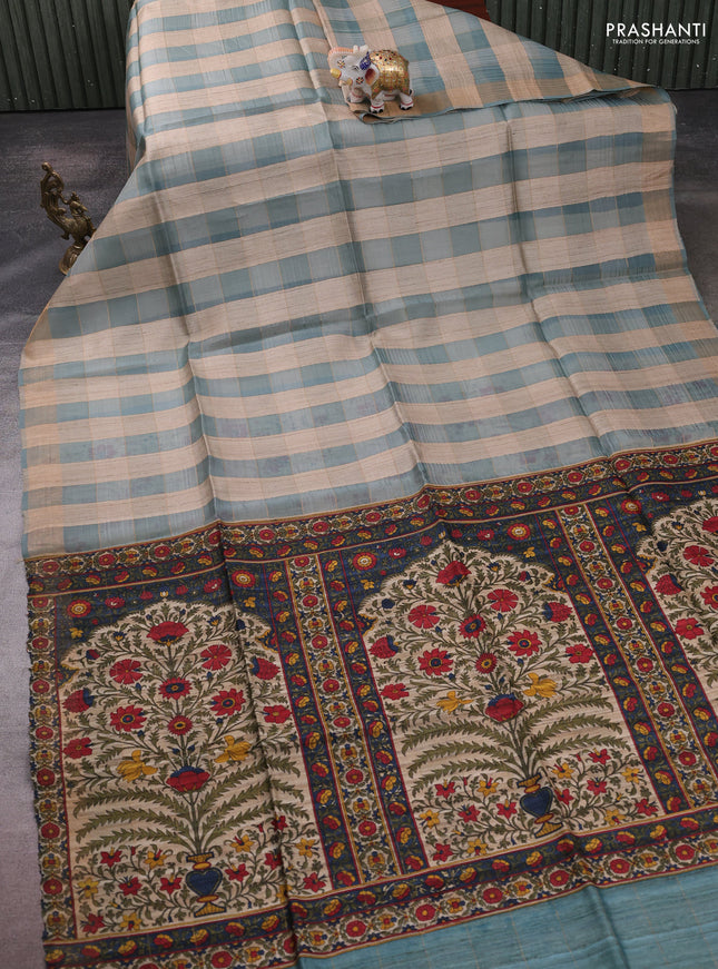 Pure dupion silk saree pastel blue beige and pastel blue with allover zari woven checked pattern and printed pallu