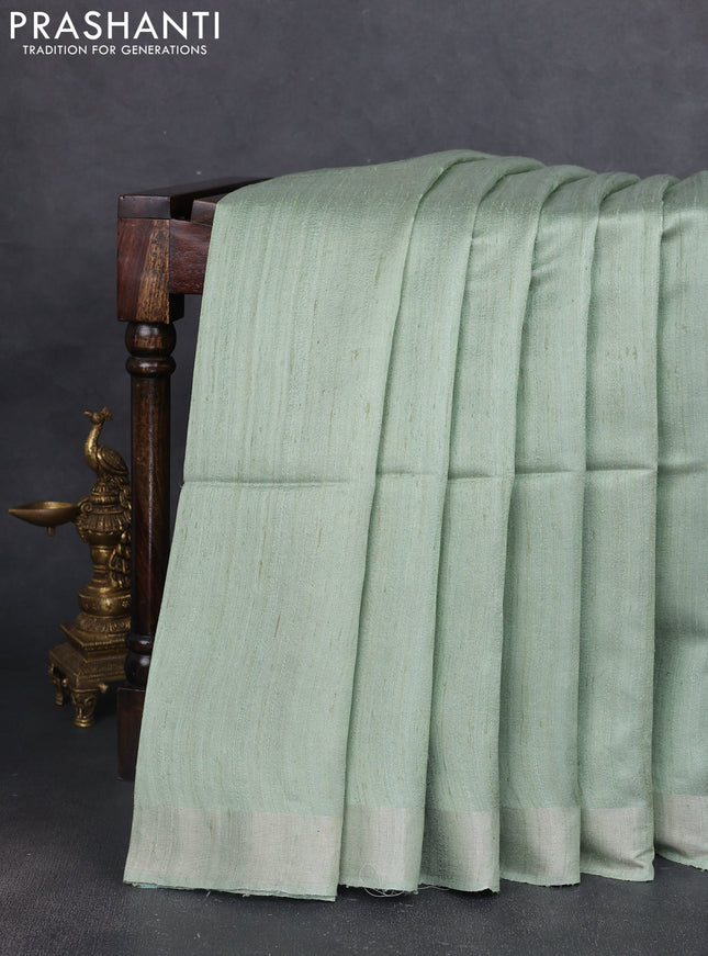 Pure dupion silk saree pastel green and multi colour with thread woven buttas and concept printed pallu