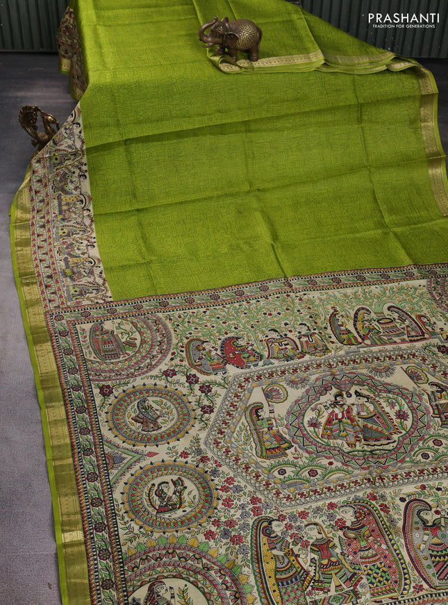 Pure printed silk saree light green with allover prints and madhubani printed zari woven border