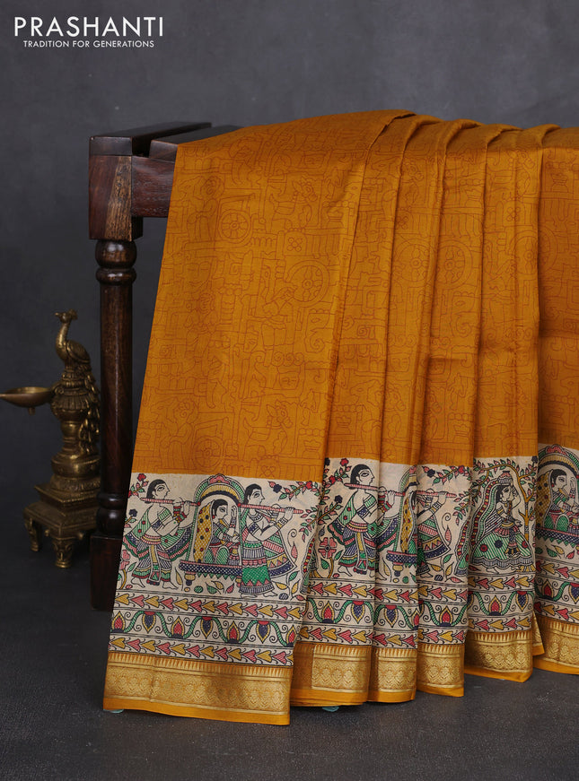 Pure printed silk saree mustard yellow with allover prints and madhubani printed zari woven border