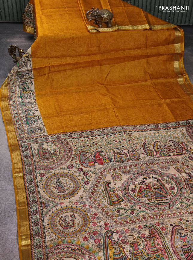 Pure printed silk saree mustard yellow with allover prints and madhubani printed zari woven border