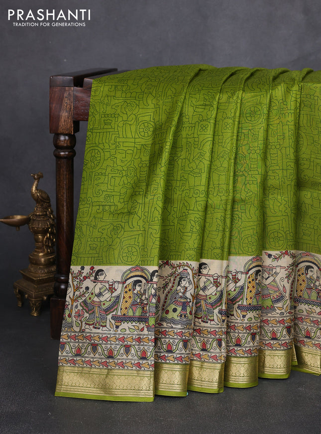 Pure printed silk saree light green with allover prints and madhubani printed zari woven border