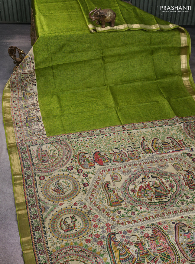 Pure printed silk saree light green with allover prints and madhubani printed zari woven border