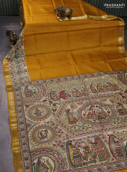 Pure printed silk saree mustard yellow with allover prints and madhubani printed zari woven border