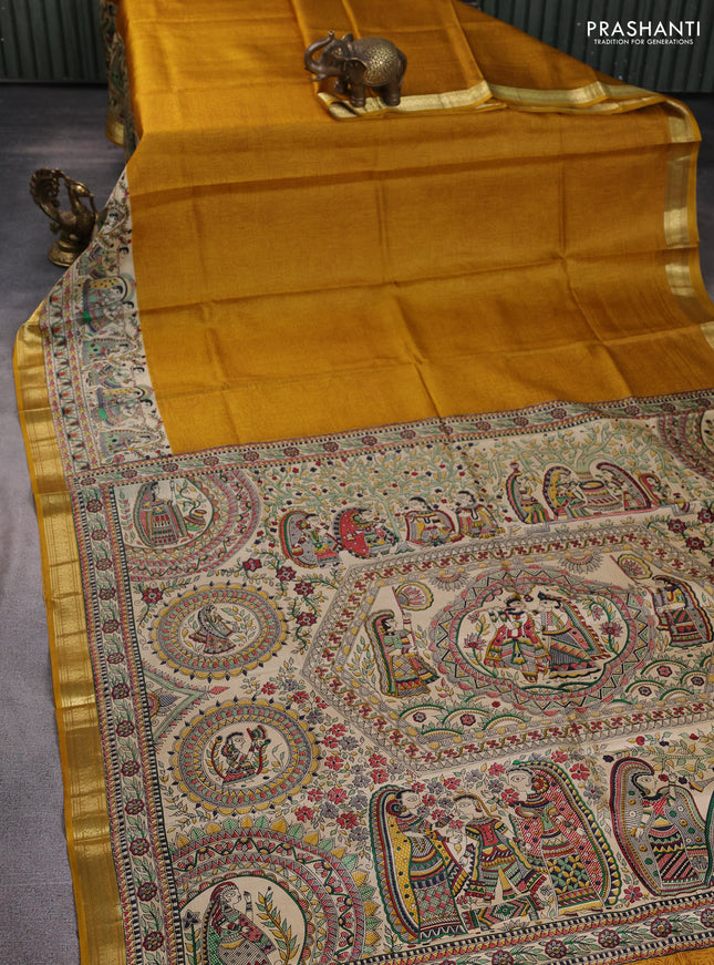 Pure printed silk saree mustard yellow with allover prints and madhubani printed zari woven border