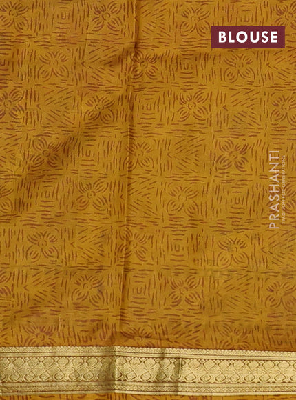 Pure printed silk saree mustard yellow with allover prints and madhubani printed zari woven border